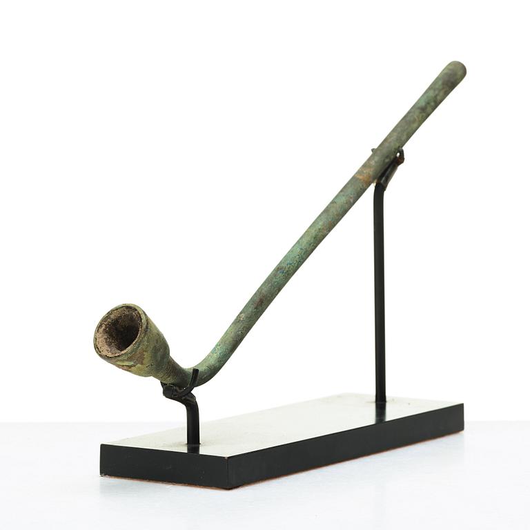 A bronze sculpture/pipe, presumably South East Asian.