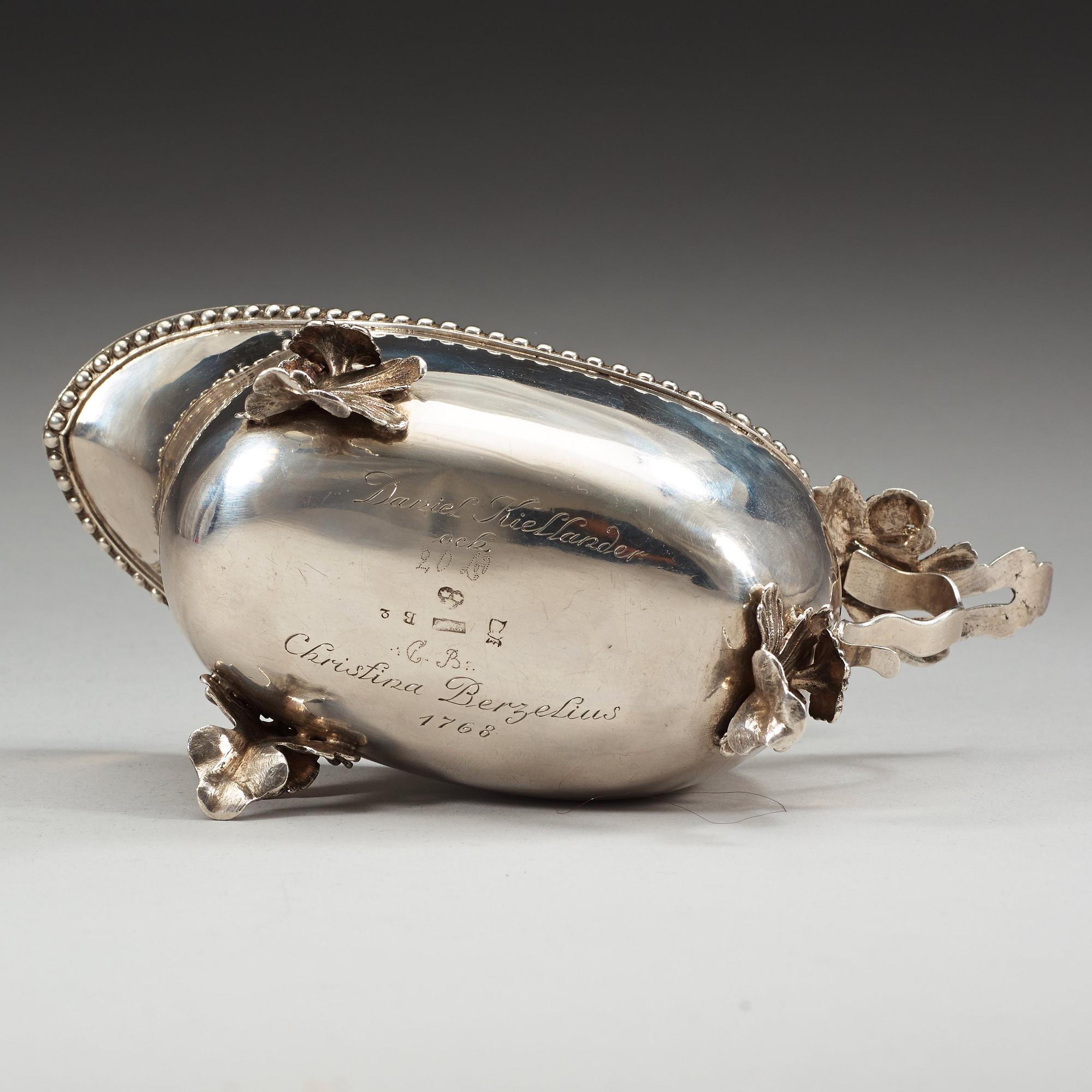 A Swedish 18th century parcel-gilt cream-jug, marks of Petter Norlin, Malmö 1784.