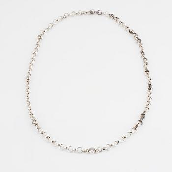CECILIA JOHANSSON a rock crystal necklace.