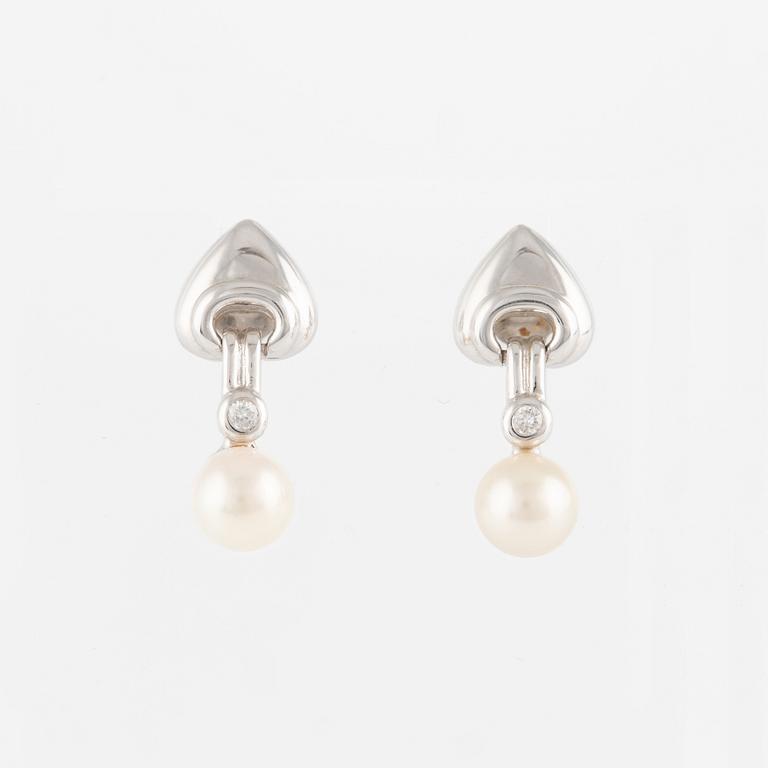 Earrings, a pair, 18K white gold, with pearls and small brilliant-cut diamonds.