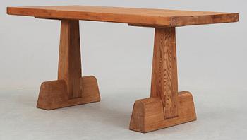 An Axel Einar Hjorth 'Utö' stained pine table, Nordiska Kompaniet, Sweden 1930's.