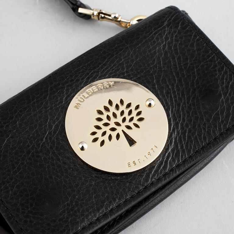 Two mobile cases named "Daria Mini Messenger" and a keyring from Mulberry.