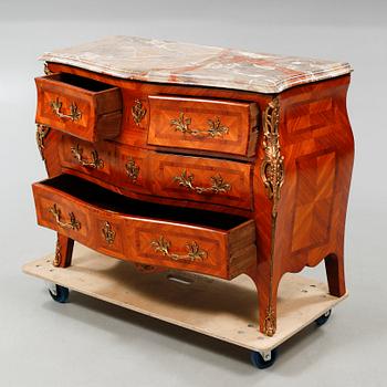 A rococo style chest of drawers, around the mid 20th century.