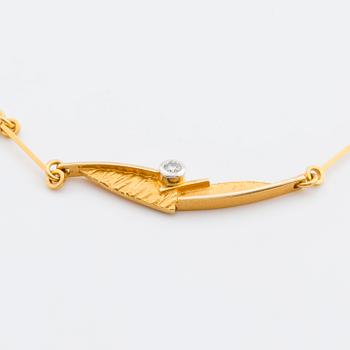 LAPPONIA NECKLACE 18K gold 1 brilliant-cut diamond 0,03 ct engraved, Finland 2002.