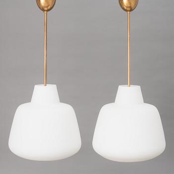 A pair of Swedish Modern ceiling lamps, mid 20th century.