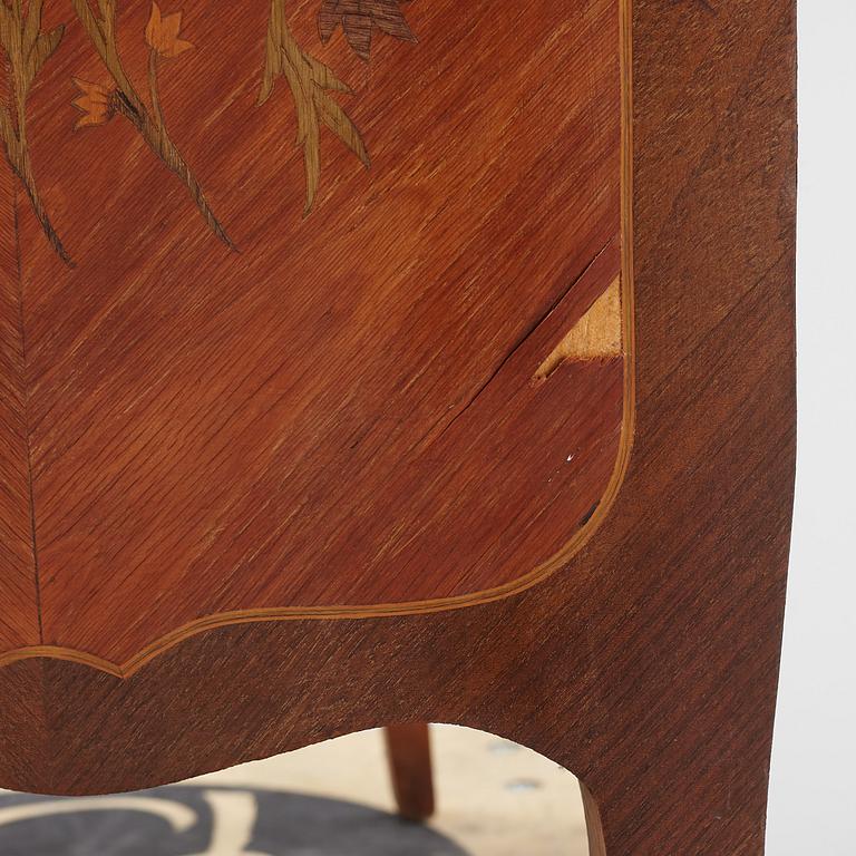 A Louis XV-style marquetry commode, first part of the 20th century.