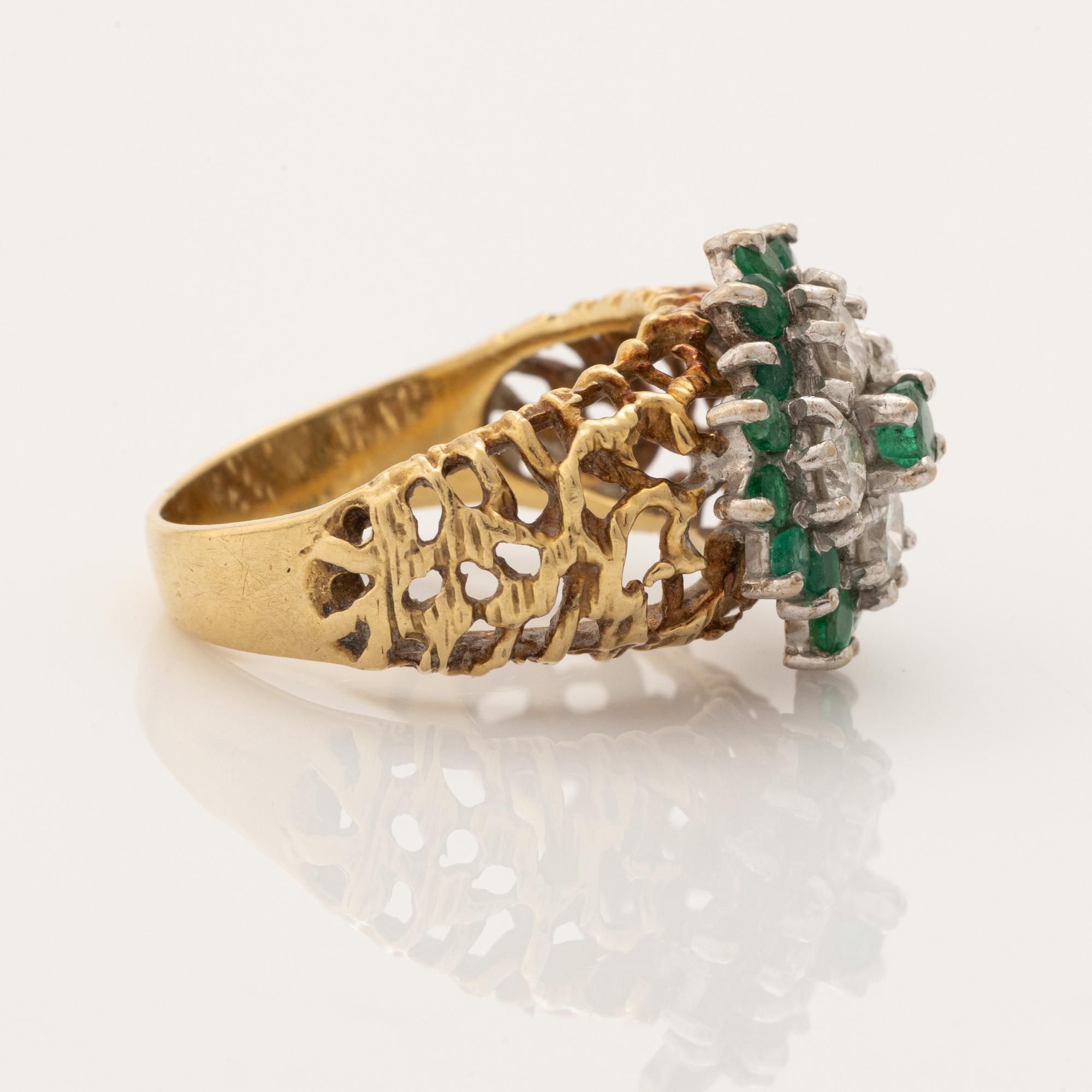 18K gold and brilliant cut diamond and emerald ring.