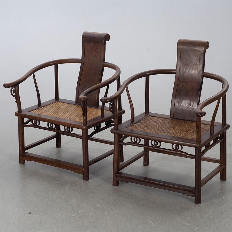 A pair of Chinese later part of the 20th century armchairs.