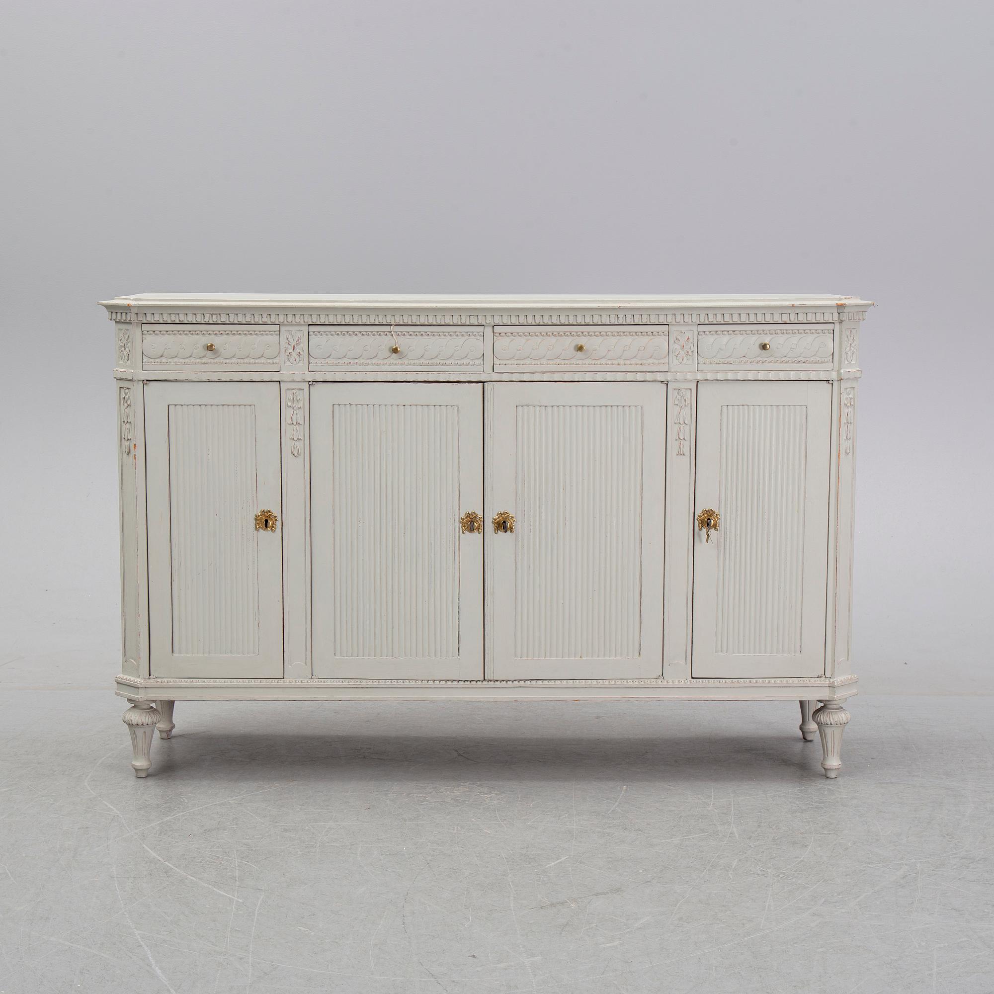 A painted Gustavian style cupboard, 19th Century.