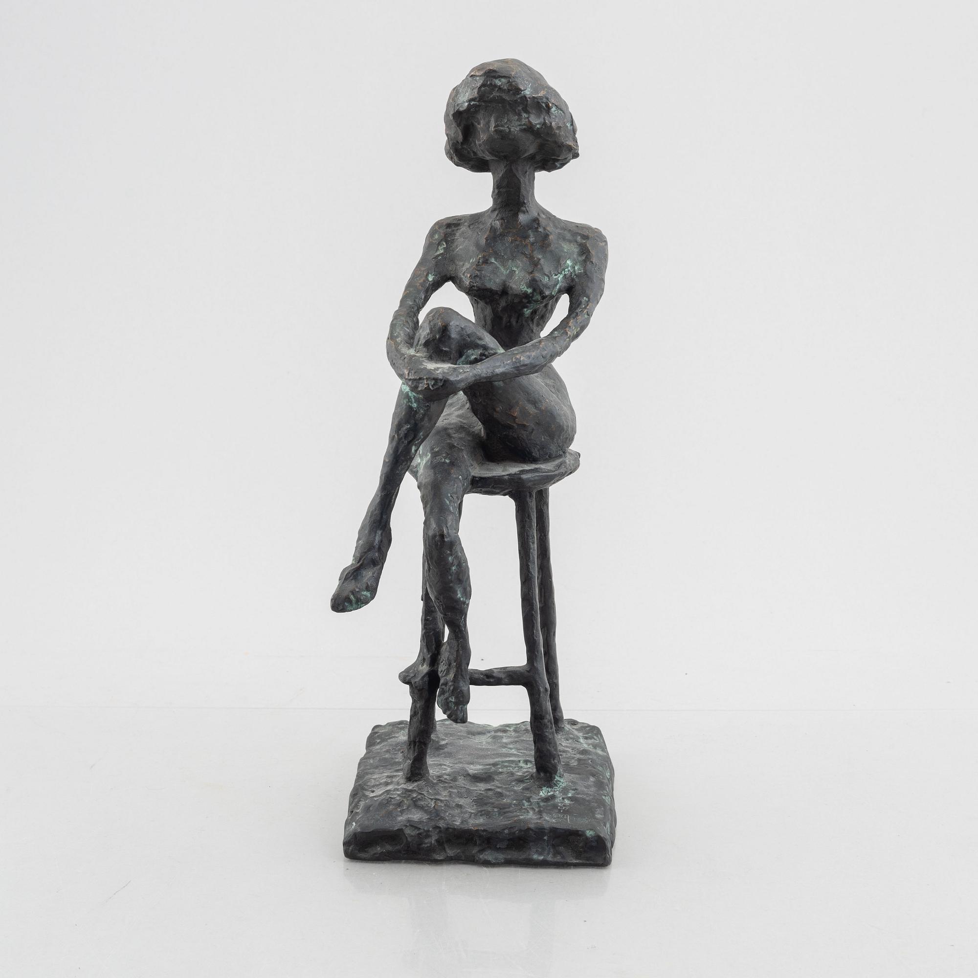 Inga Bagge, A seated woman.