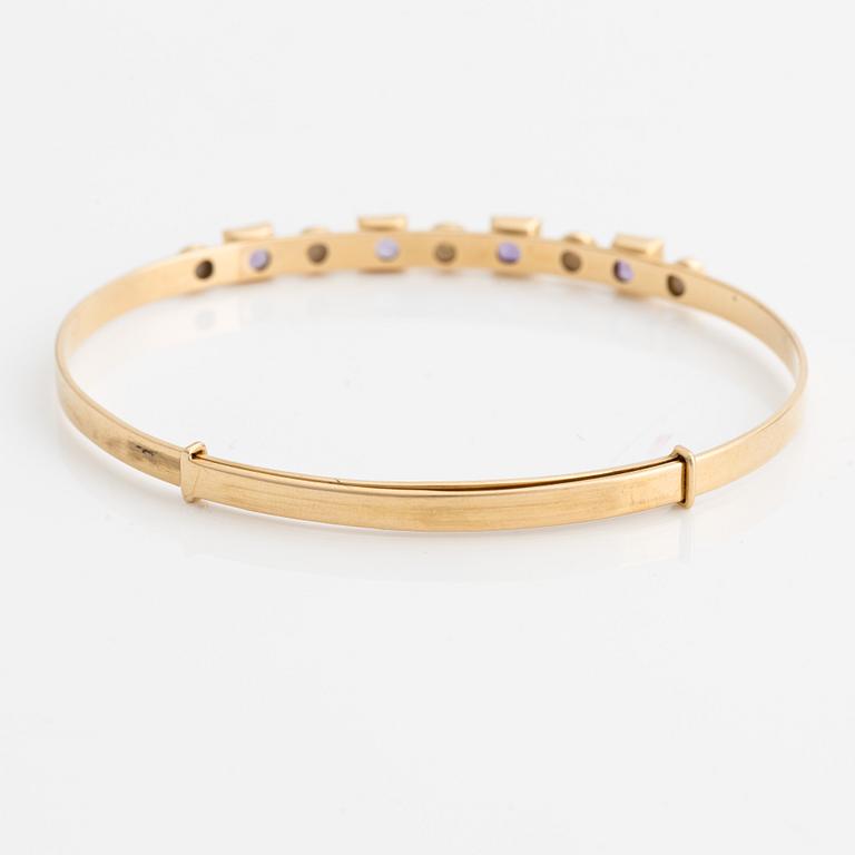 Armring, 18K guld med pärlor och ametister. Stockholm 1964.