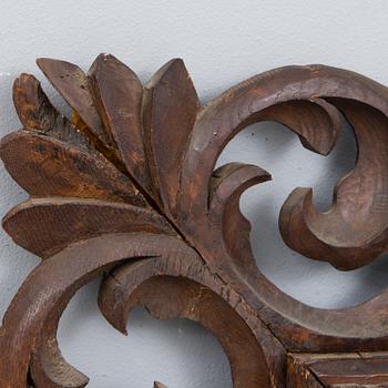 A BAROQUE MIRROR, late 19th century.