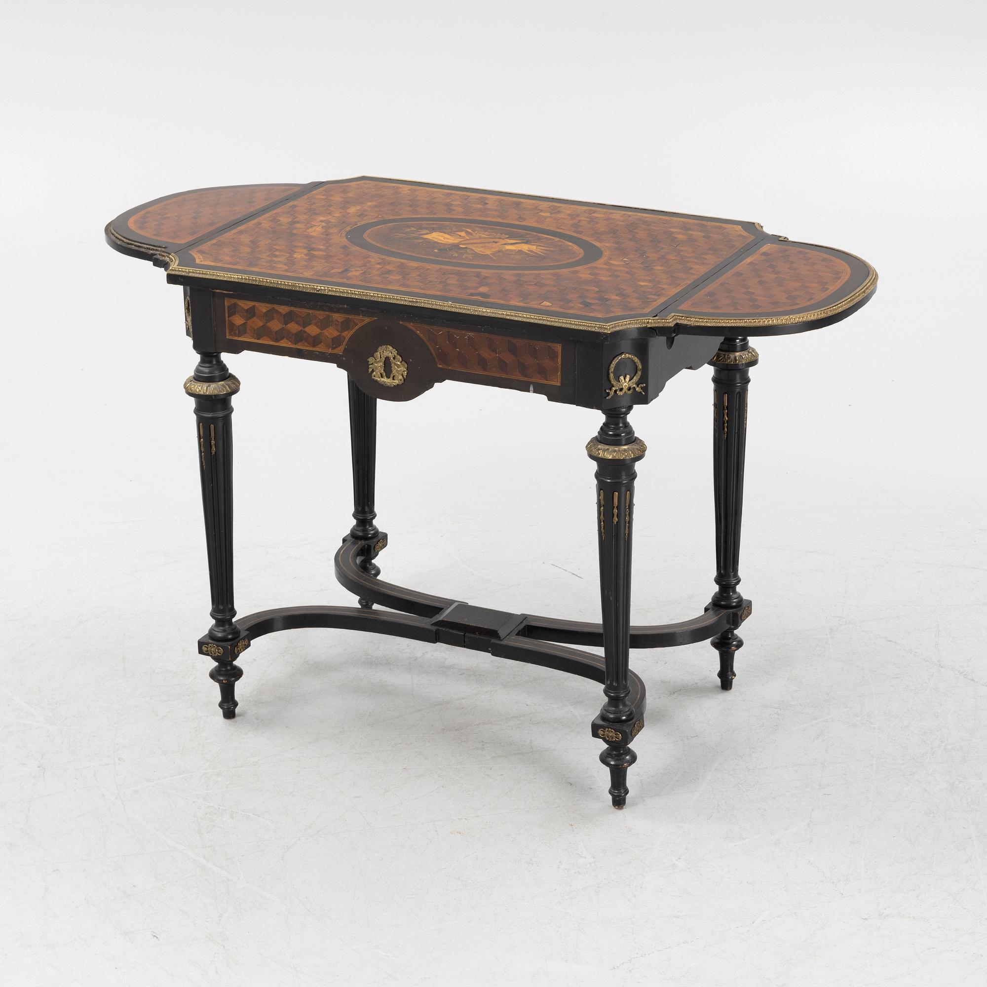 A Louis XVI style table, second half of the 19th century.
