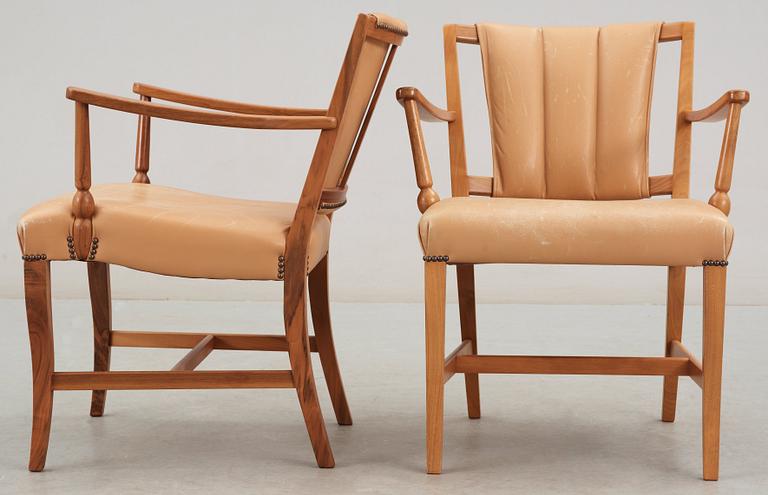A pair of Josef Frank walnut and light brown leather armchairs, Svenskt Tenn.