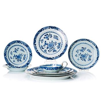 1147. A blue and white dinner service, Qing dynasty, 18th Century. (51 pieces).