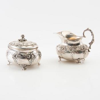 Sugar bowl, cream jug, tray and sugar tongs, 5 dlr silver, Swedish import marks, Rococo style.