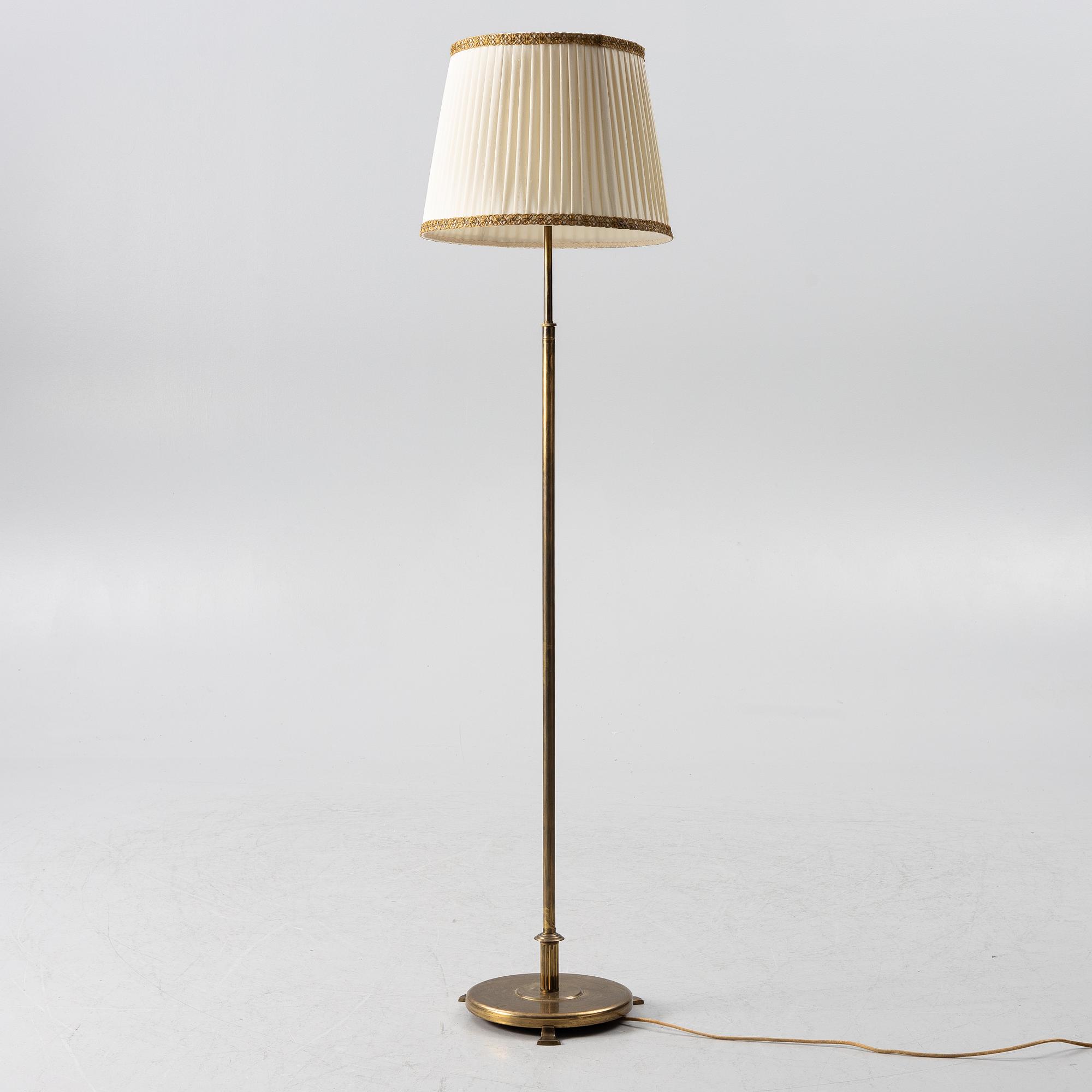A brass floor lamp, 1940s.