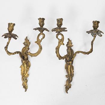 A pair of Rococo style wall sconces, 19th century.