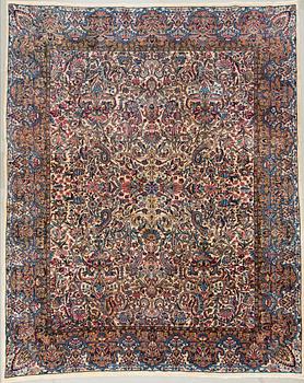 A semi-antique carpet from Kerman, 346 x 273 cm.