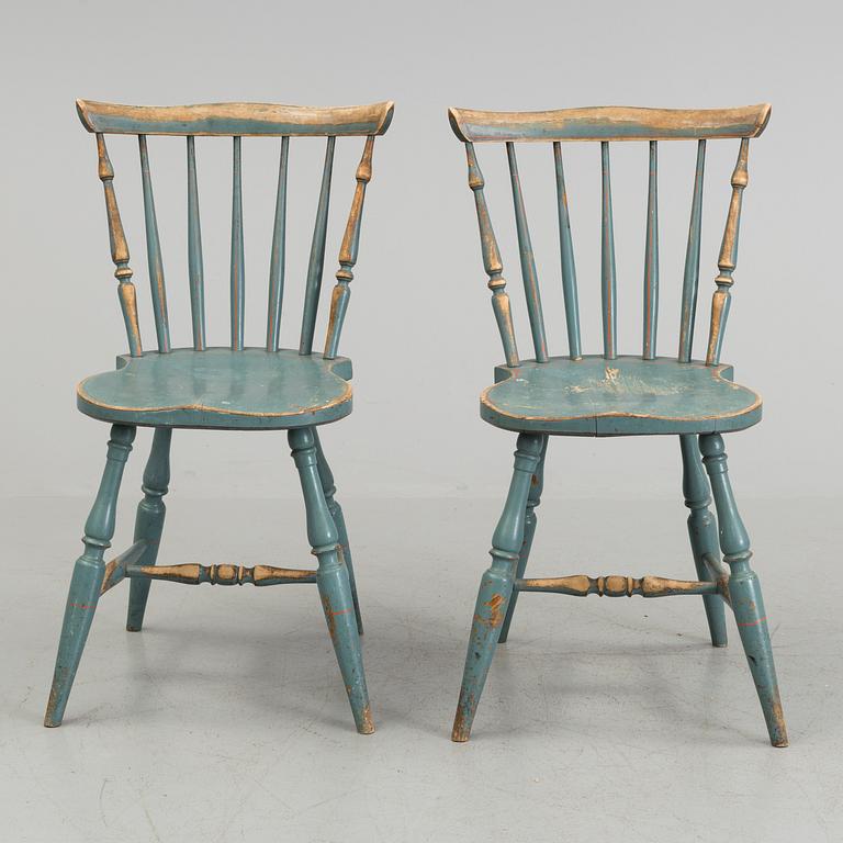 A pair of late 19th century painted chairs.