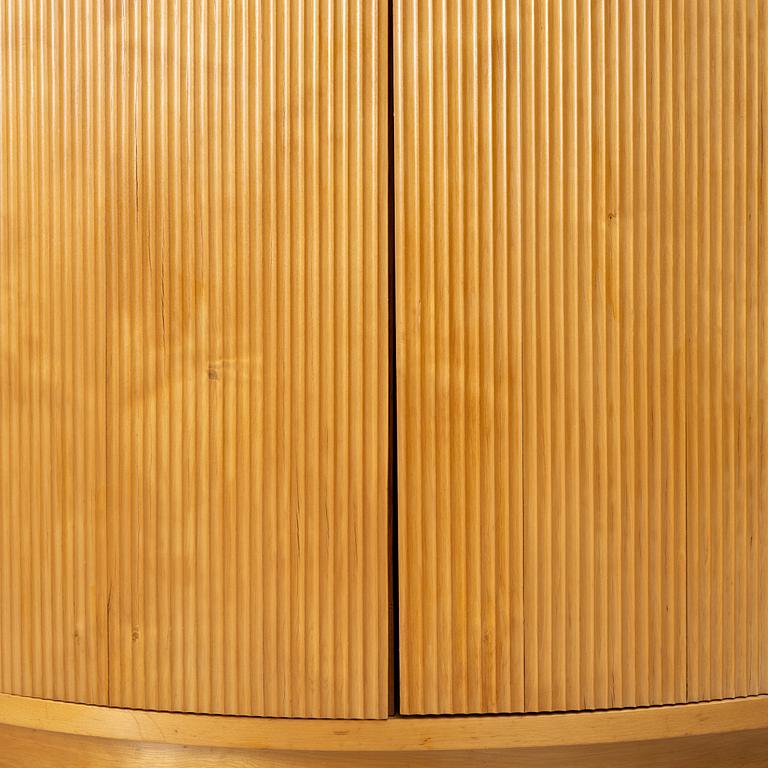 Corner cabinet, circa the mid-20th century.