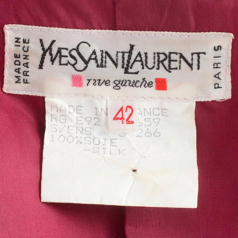 YVES SAINT LAURENT, a two-piece polka dotted blue cotton blend dress consisting of jacket and skirt.