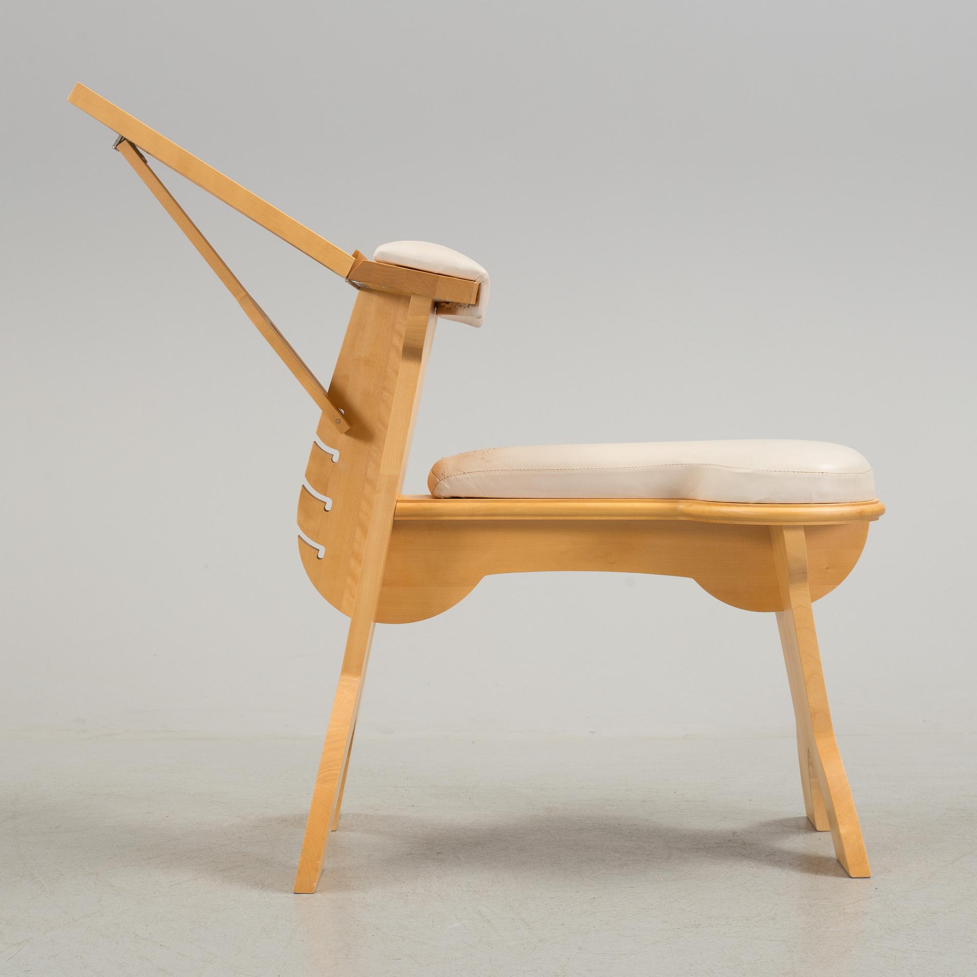 a "plugghästen" chair by Peter Lind.