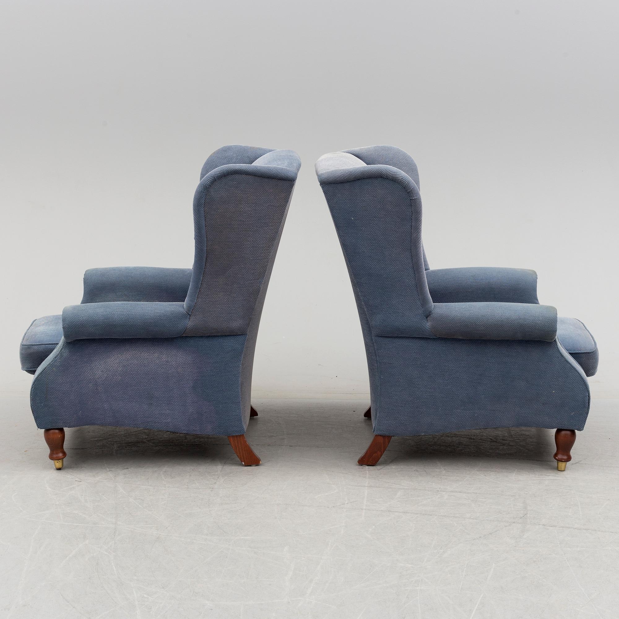 A pair of Parker Knoll 'York' wing chairs.