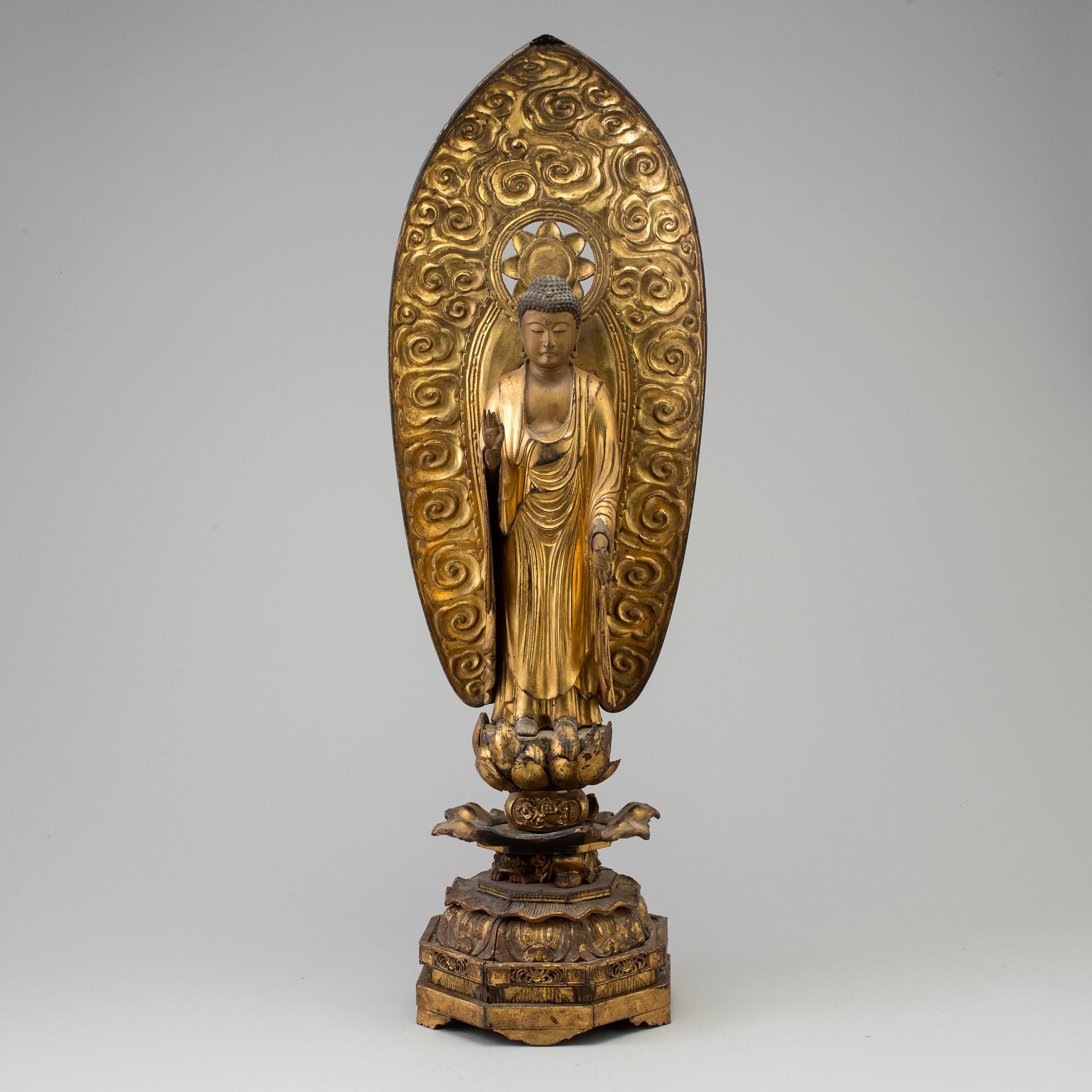 A large wooden lacquered figure of buddha, Japan, 19th Century.