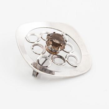 Arm ring and brooch, silver with smoky quartz, Kultasepät Salovaara.