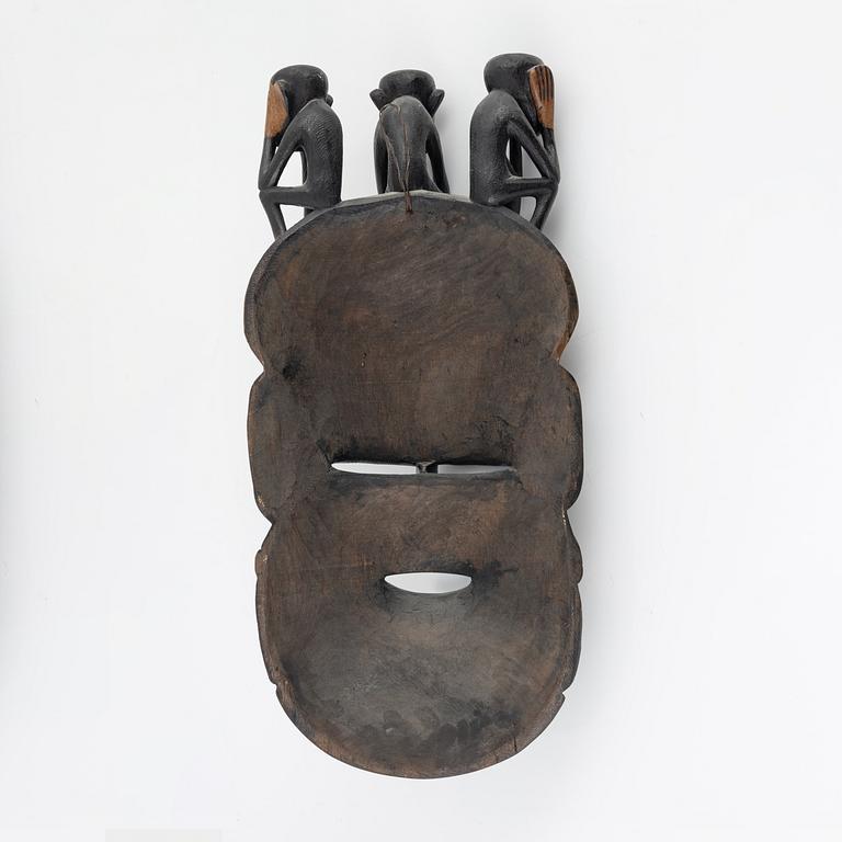 A wooden mask, Gambia, 21st Century.