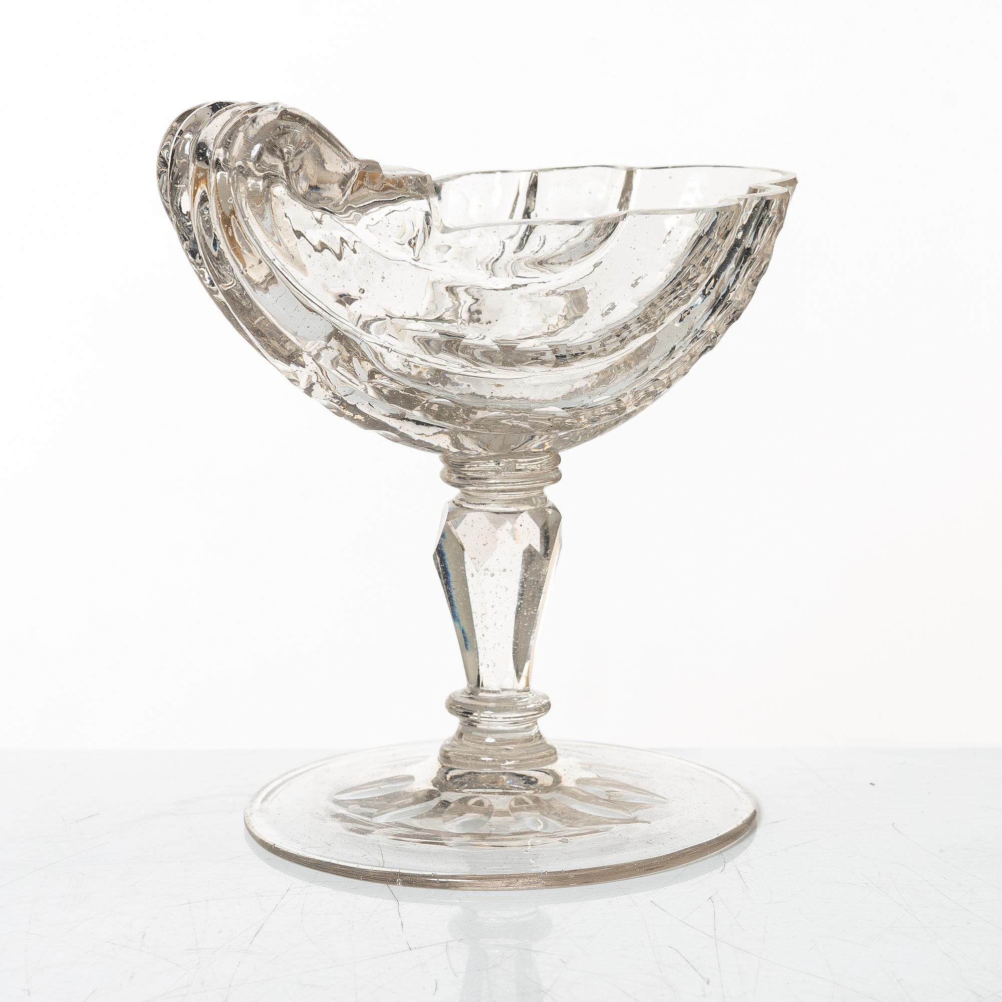 A cut glass, shell formed, bowl on facetted stem, Silesia, 18th Century.