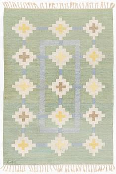 A flat weave carpet, signed GK, Sweden, c. 243 x 171 cm.