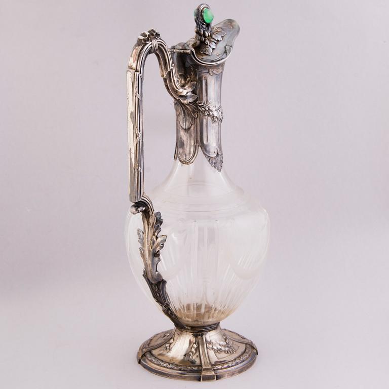 A French silver and crystal wine jug with six beakers, Russian import marks, circa 1900.