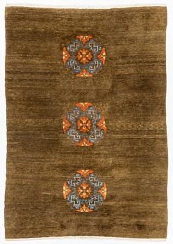 A Tibetan rug, c. 240 x 170 cm.