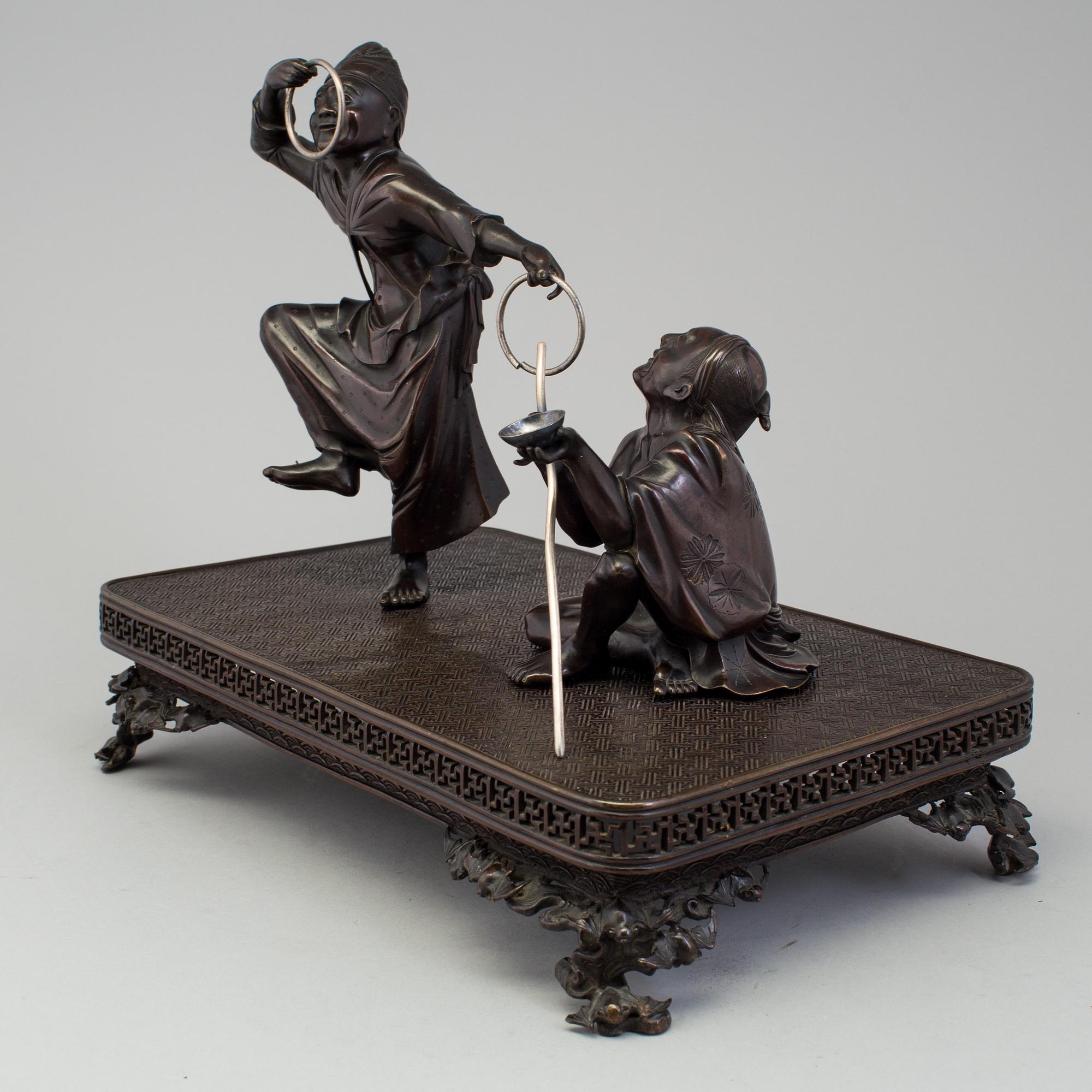 A Japanese bronze sculpture group, Meiji period (1868-1912).