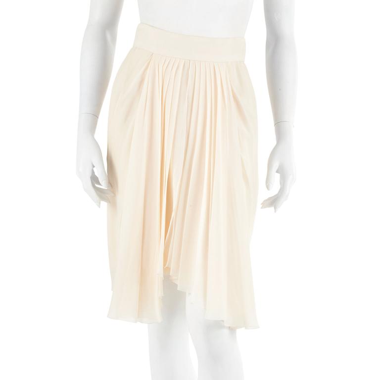 CHANEL, a bonewhite silk skirt. French size 40.