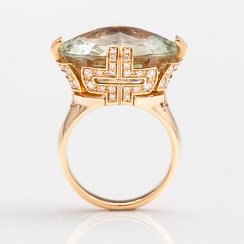 BULGARI, An 18K gold ring "Parentesi" with a green quartz and ca. 0.70 ct of  brilliant cut diamonds in total.