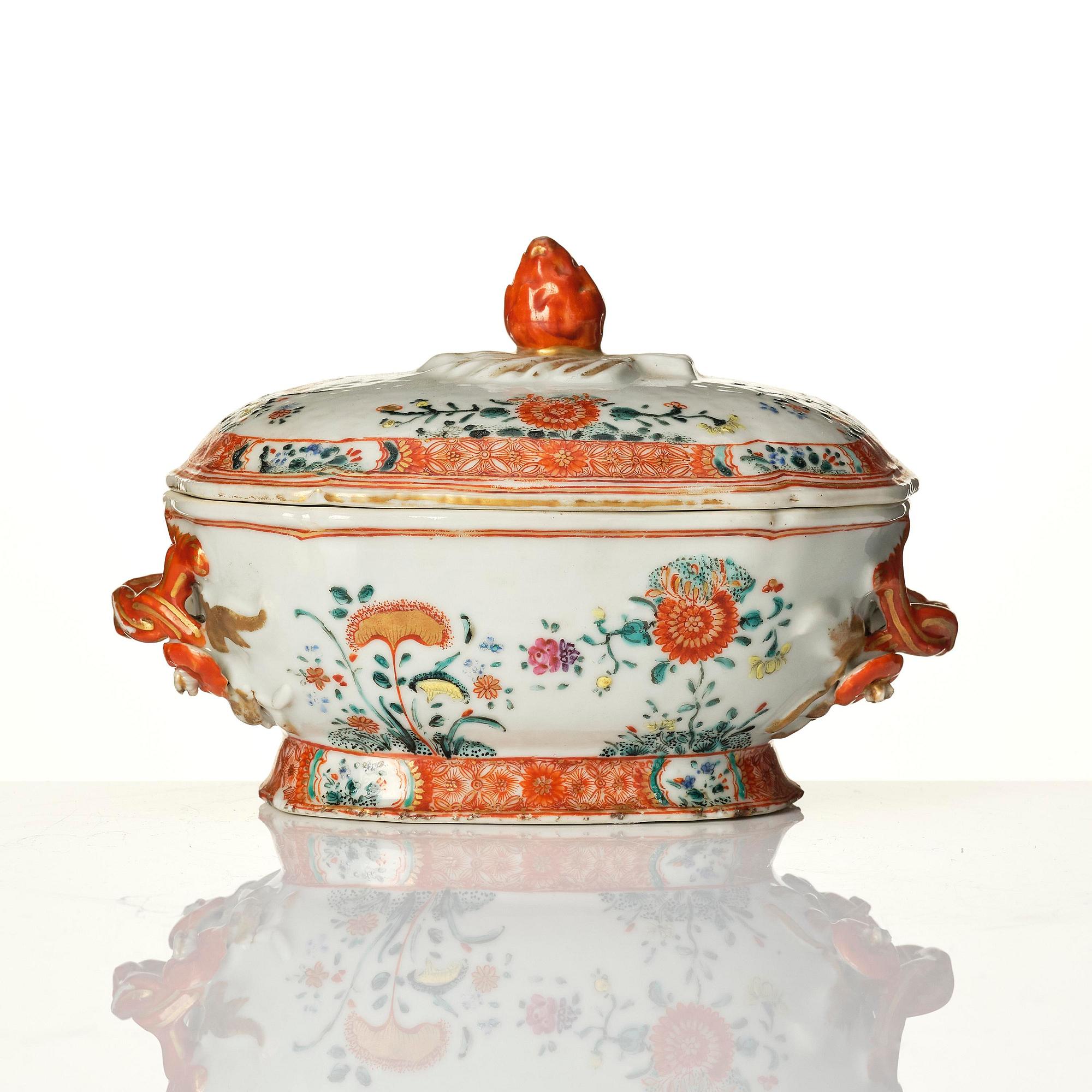 A famille rose butter tureen with cover and stand, Qing dynasty, 18th century.