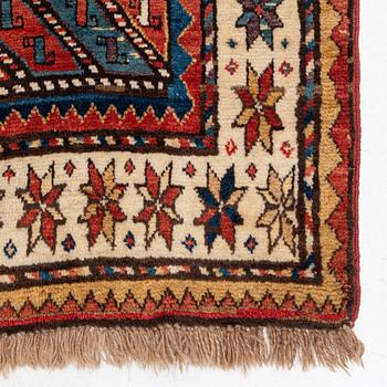 An antique Gendje rug, south Caucasus, c. 208 x 103 cm.