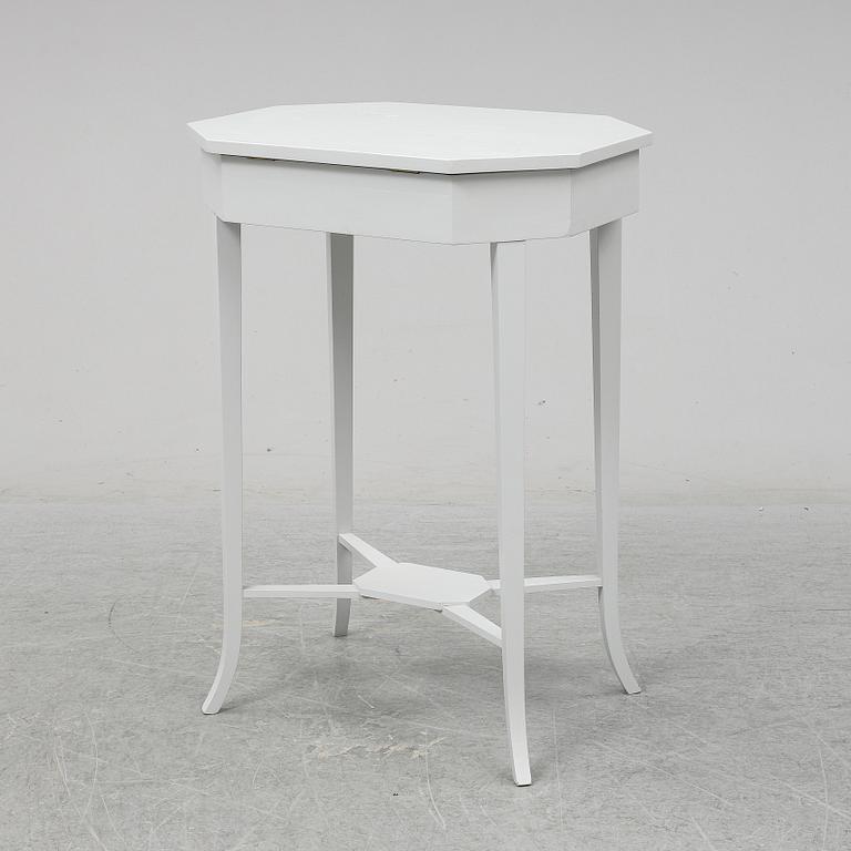 A ladys working table 20 th century.