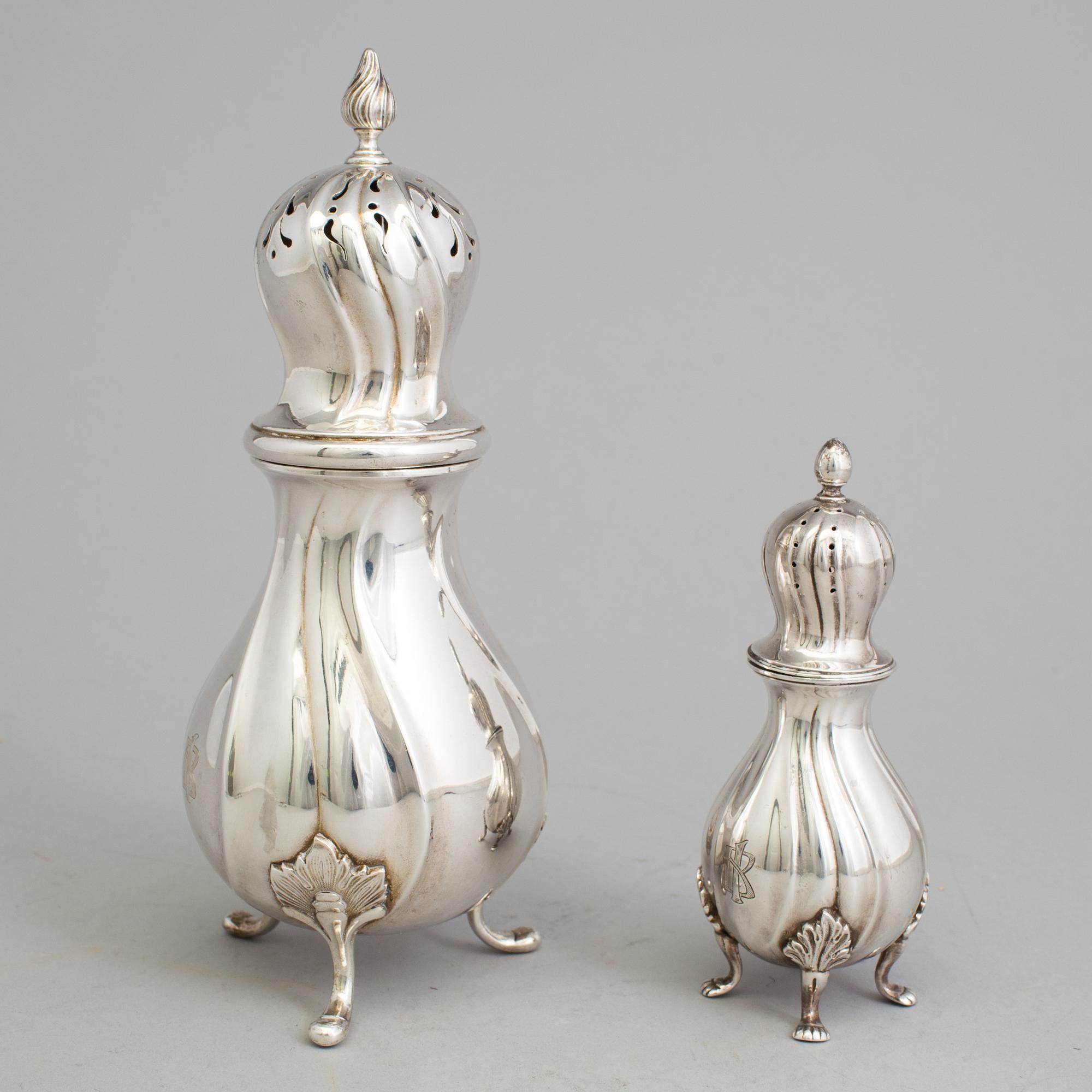 Two 20th century silver casters, one marked CG Hallberg, Stockholm 1938 and one with Swedish import marks.