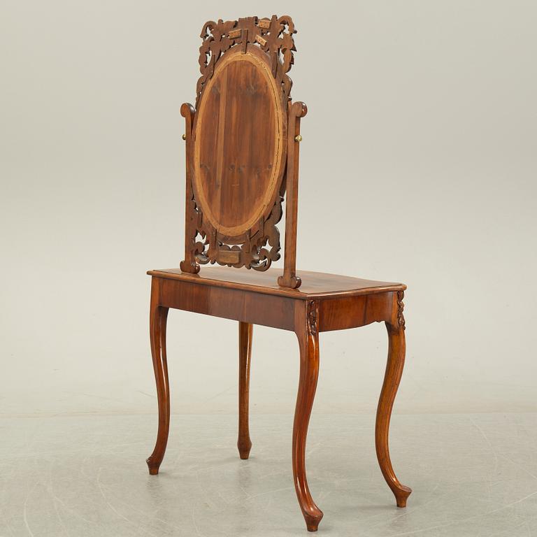 A rococo style dressing table, 19th Century.