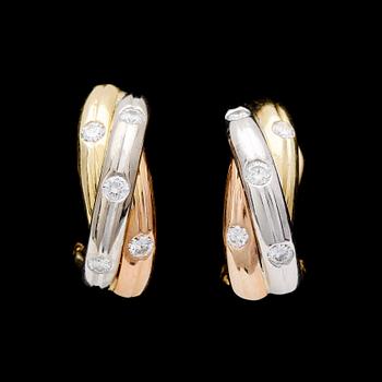 230. EARRINGS, three coloured gold and brilliant cut diamonds, tot. app 0.40 cts.