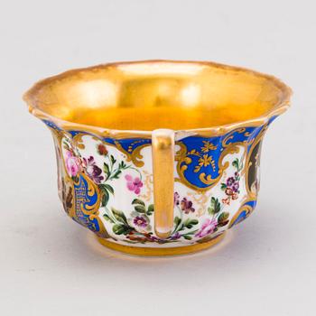 A Popov porcelain cup with saucer, Russia mid-19th Century.