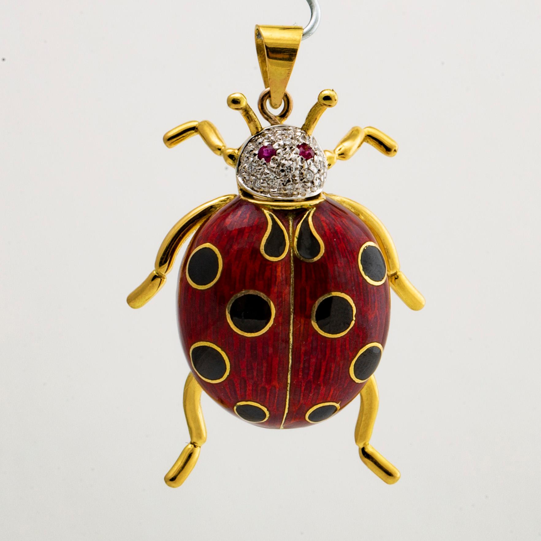 PENSANT 18k gold, brilliant-cut diamonds, 2 rubies and enamel, approx 4 x 3 cm.