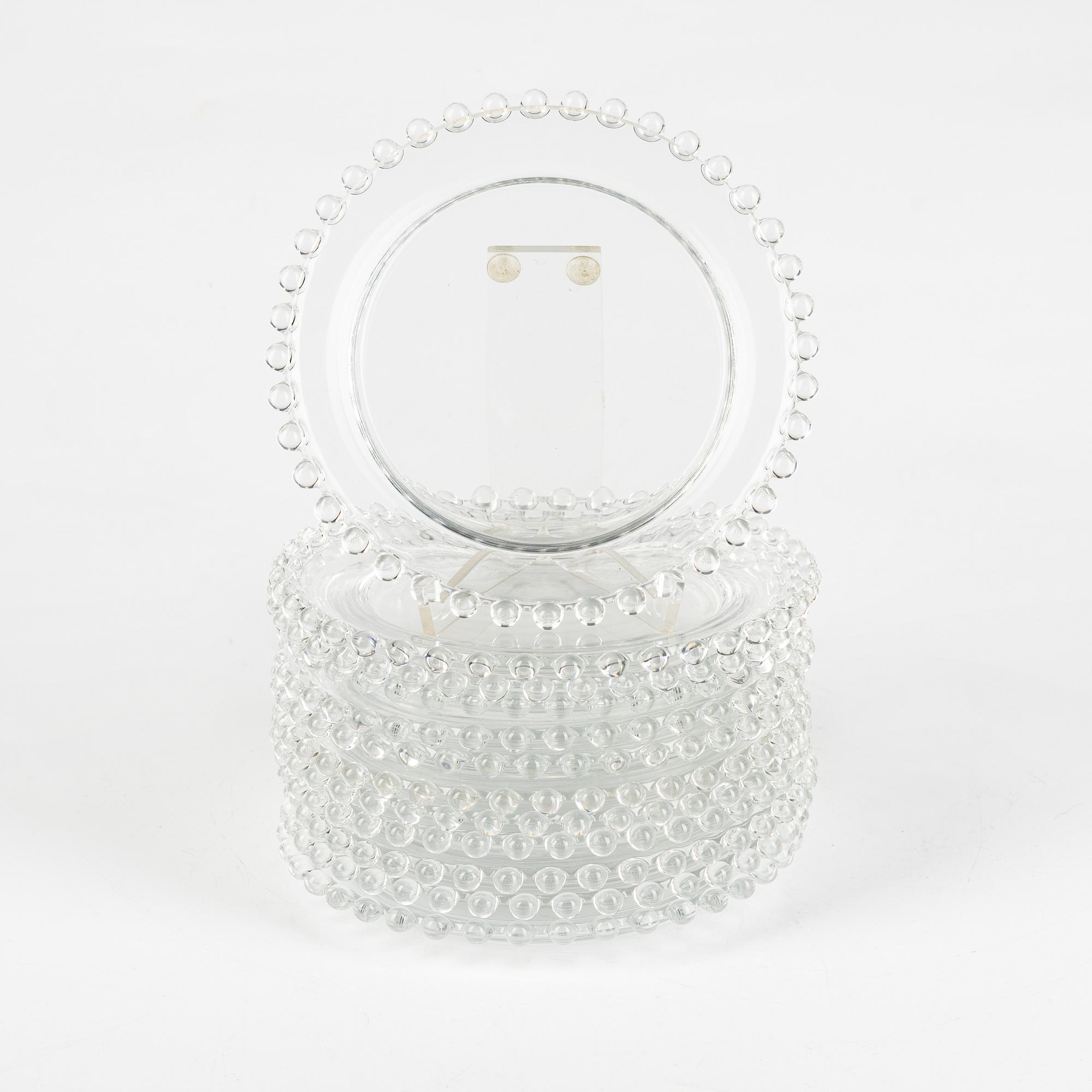 René Lalique, twelve signed glass dishes, 'Andlau', the model designed in 1933.