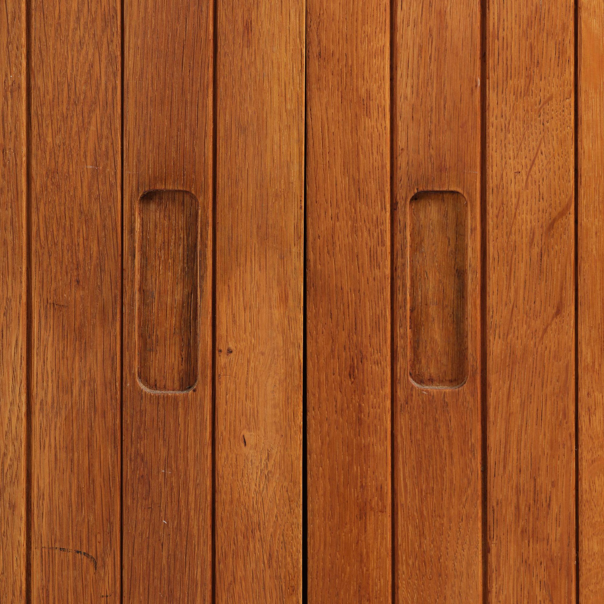 Jørgen Høj, an oak cabinet, Knud Willadsen Møbelsnedkeri, Lillerød, Denmark, 1950s.