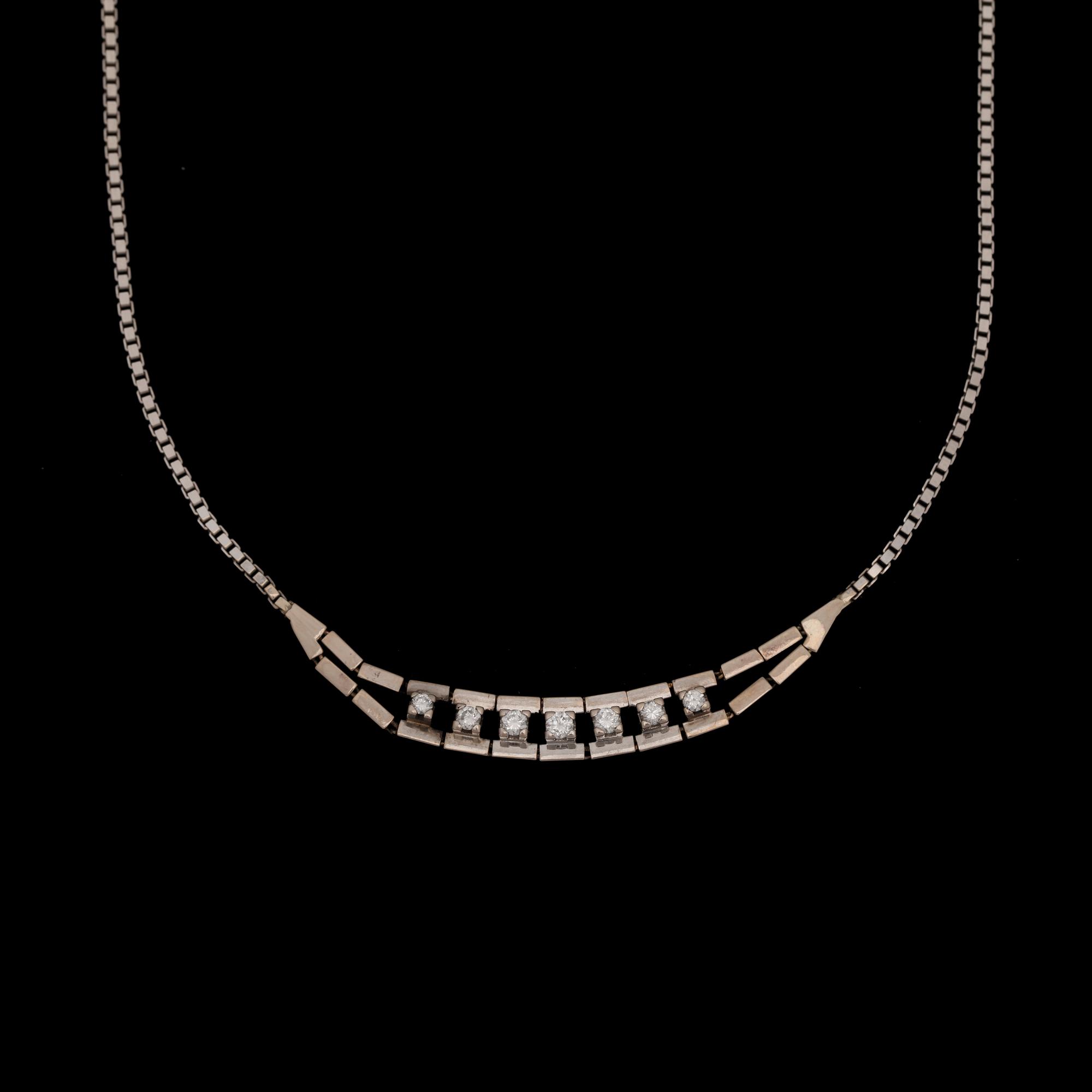 A brilliant cut diamond neclace, tot. app. 0.40 ct.