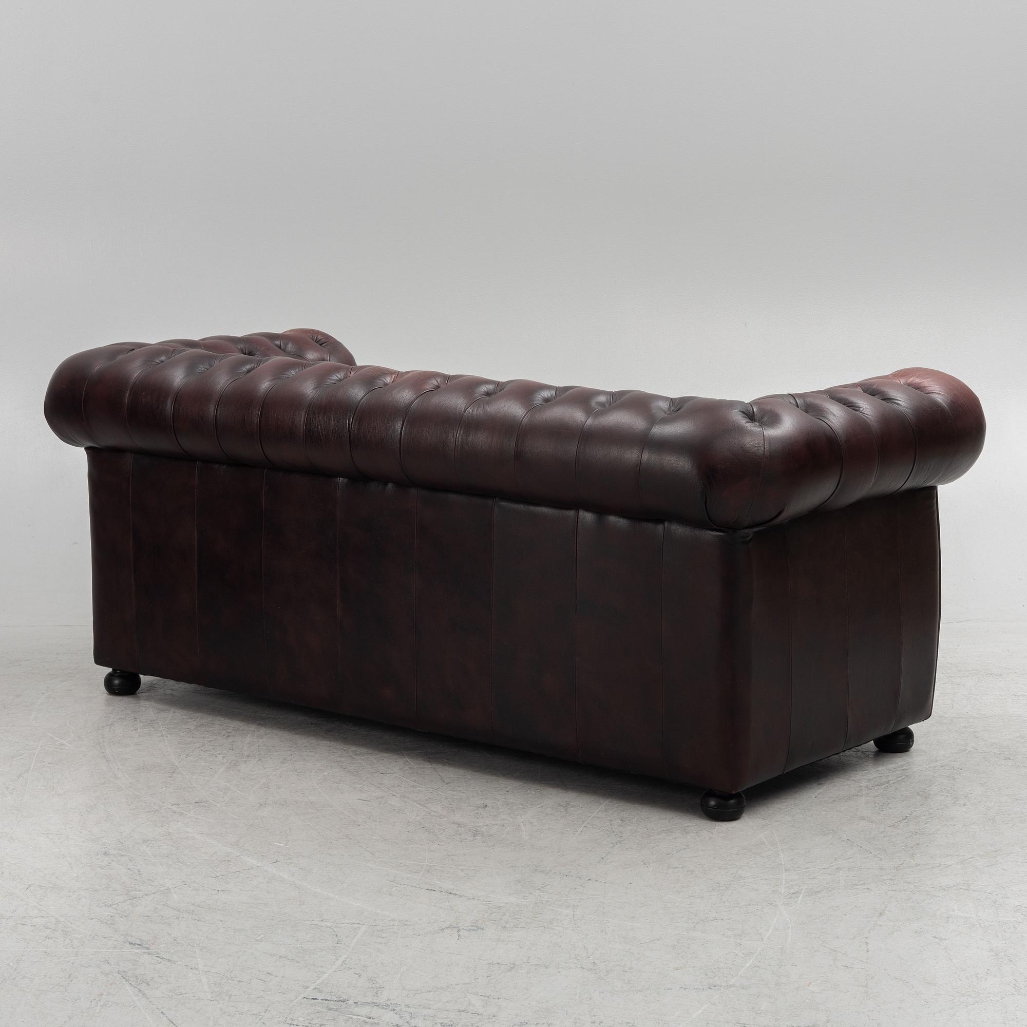 Sofa and armchair, Chesterfield, second half of the 20th Century.